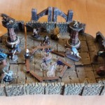 close up on D&D mini terrain with mini's set up for a fight