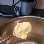 spoonful of margarine held over an instapot