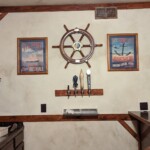 Taps/bar area - Quinn's grandfather's Navy retirement ship wheel