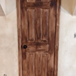 Painted closet door to look like wood