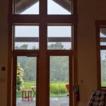 View from inside the Lodge, where my breakout group met Interior view of the back porch, rustic and verdant